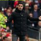 Mikel Arteta gestures at Anfield during Arsenal vs Liverpool match.
