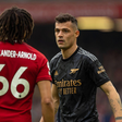 Arnold and Xhaka face off during the Arsenal vs Liverpool clash