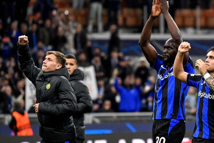 Nicolo Barella, Romelu Lukaku and Lautaro Martinez of FC Internazionale celebrate at the end of the Champions League football match
