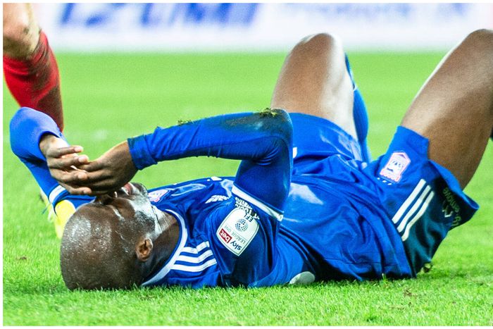 Sone Aluko hangs boots.