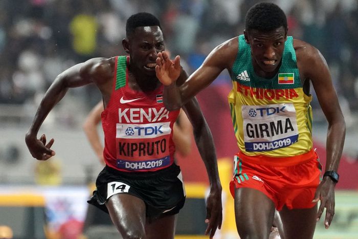 Conseslus Kipruto (L) and Lamecha Girma