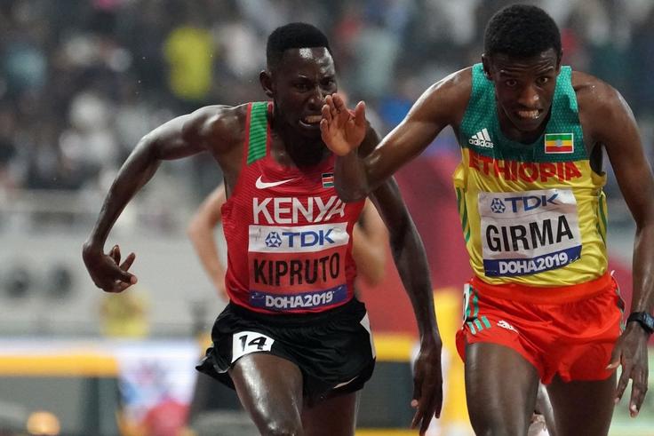 Conseslus Kipruto (L) and Lamecha Girma