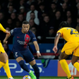 Kylian Mbappe (7) (Paris St Germain (PSG)) tries to pass Ronald Araujo and Jules Kounde during the Champions League match between Paris Saint-Germain (PSG) and FC Barcelona, Barca at Parc des Princes. (Photo by Glenn Gervot/Icon Sportswire)