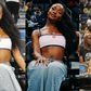Nigerian star Ayra Starr shows off style at a WNBA game featuring Atlanta Dream and Chicago Sky.