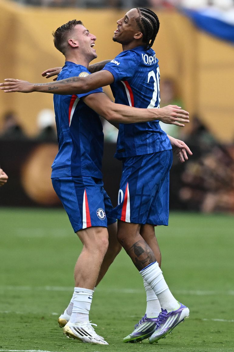 Liam Delap and Joao Pedro celebrate after Chelsea beat PSG