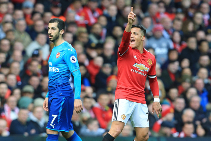 Photo by Matt West BPI Shutterstock (9645691s) Alexis Sanchez of Manchester United, ManU and Henrikh Mkhitaryan of Arsenal