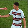 Kevin De Bruyne and Cristiano Ronaldo shake hands during a match between Belgium and Portugal.