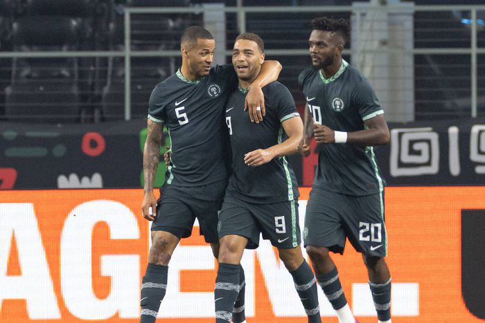 Cyriel Dessers alongside William Troost-Ekong and Chidozie Awaziem | Imago