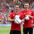 Mikael Silvestre alongside Man United legends Gary Neville, Dimitar Berbatov, and Paul Scholes | Imago