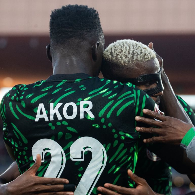 Akor Adams and Victor Osimhen celebrate the opener for Nigeria. (Photo Credit: CAF/X)