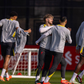 Liverpool s Harvey Elliott with Mohamed Salah as Trent Alexander-Arnold looks on during a training session ahead of the UEFA Champions League Round of 16 2nd Leg match between Liverpool FC and Paris Saint-Germain. (Photo by David Rawcliffe Propaganda)