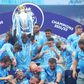 Manchester City players celebrate winning the 2021-2022 Premier League.