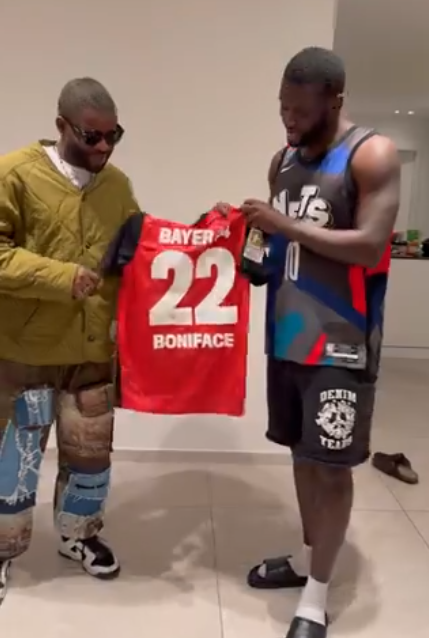 Nigerian Afrobeats star Skales moves on from Lamine Yamal, gifted Bayer Leverkusen jersey by Super Eagles star Victor Boniface in Germany.