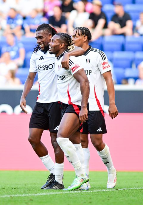 Alex Iwobi and Adama Traore after one of the goals.