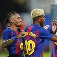 Lamine Yamal of FC Barcelona celebrates the 4-0 with Raphael Dias Belloli Raphinha and Marcus Rashford || Image credit: Imago