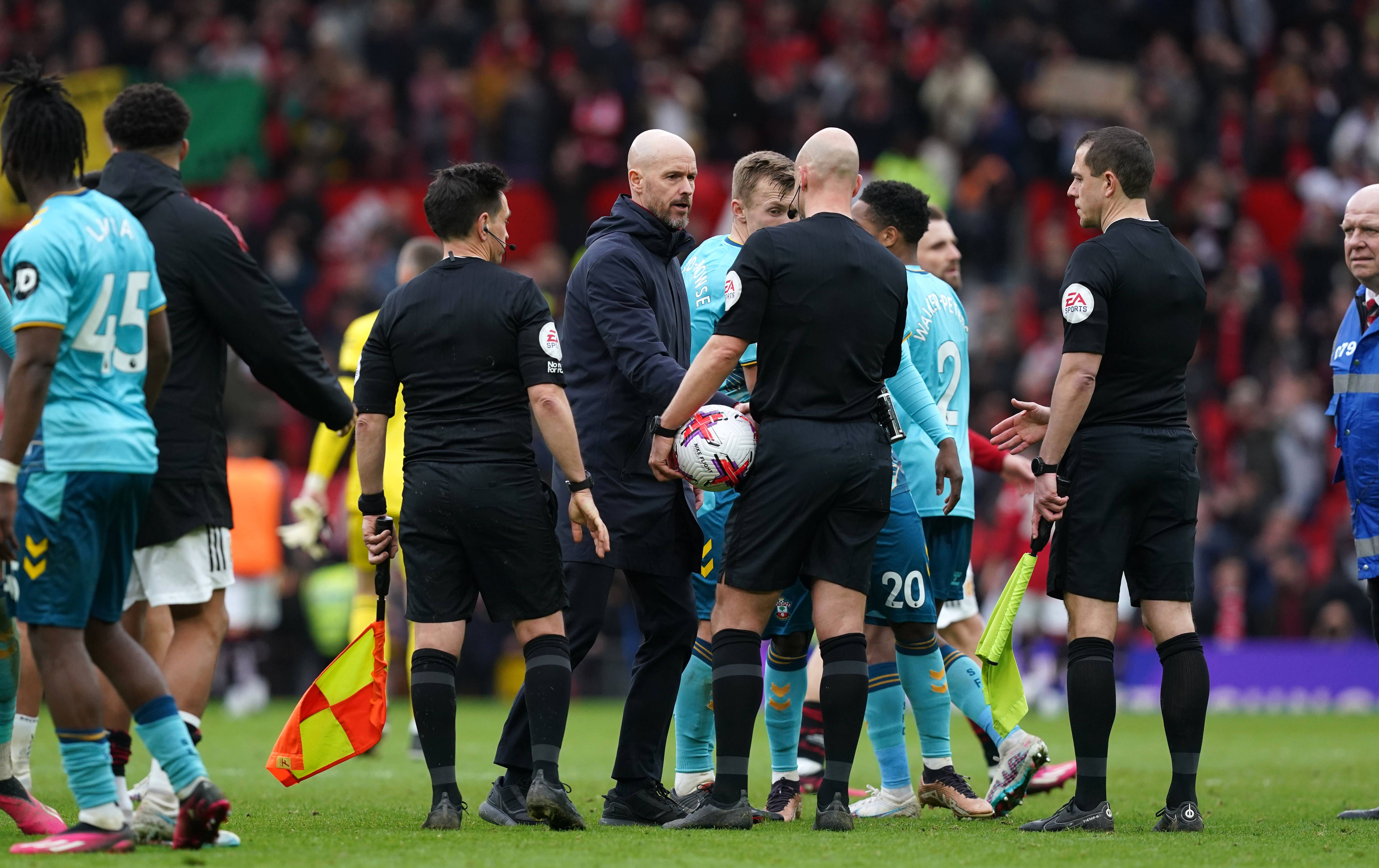 Manchester United, ManU v Southampton - Premier League - Old Trafford Manchester United manager Erik ten Hag (centre) speaks to referee Anthony Taylor