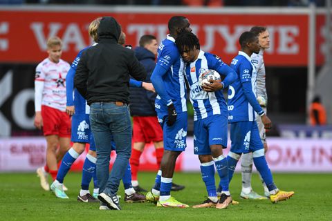 Gift Orban grabs the match ball after scoring four goals against Zulte