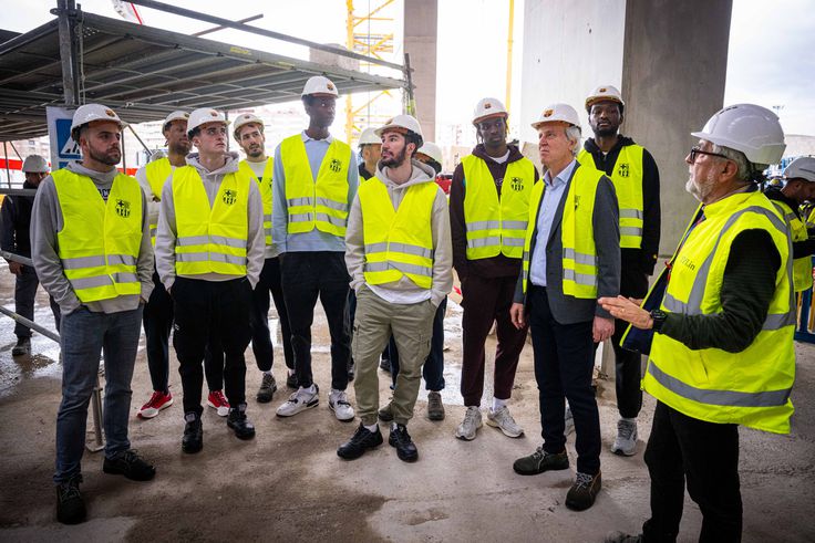 Nigerian D'Tigers basketball star Chimezie Metu leads his Barcelona on a visit to Camp Nou.