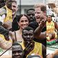 Duke and Duchess of Sussex Harry and Meghan shine with military volleyball in Nigeria.