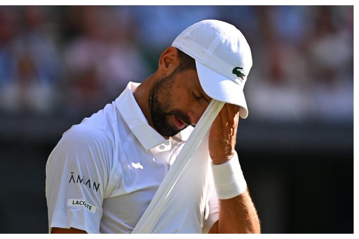 Djokovic fumes at his team