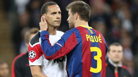 Gerard Pique consoles Rio Ferdinand after Barcelona beat Manchester United in the Champions League final || Gettyimages