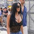 Kim Kardashian watches on as boyfriend Lewis Hamilton is rushed to medics after Singapore GP