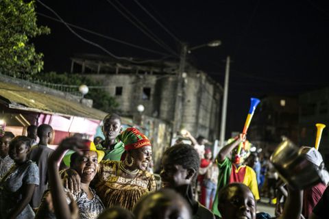 Hosts Cameroon light up Cup of Nations to qualify for knockout stages