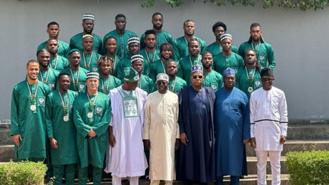 President Tinubu recieves Super Eagles and presents them with gifts following AFCON outing