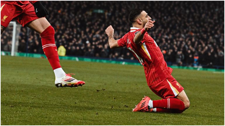 Liverpool and Premier League legend Mohamed Salah celebrates at Everton.