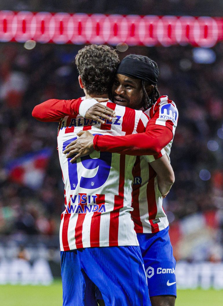 Ademola Lookman celebrates with Julian Alvarez after his goal.