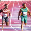 Ferdinand Omanyala at the finish line with Akani Simbine.