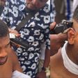 After attending Aliko Dangote’s birthday celebration, Anthony Joshua sparks online buzz by getting a street-side Haircut in Nigeria and boasts about uppercut in London.