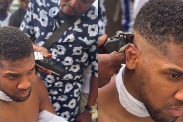After attending Aliko Dangote’s birthday celebration, Anthony Joshua sparks online buzz by getting a street-side Haircut in Nigeria and boasts about uppercut in London.