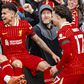 MO Salah celebrates with his Liverpool teammates.