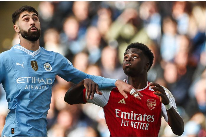 Man City's Josko Gvardiol and Bukayo Saka of Arsenal battle for the ball during a Premier League tie.