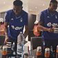 Watch Super Eagles of Nigeria star Taiwo Awoniyi pack plates and clear table after meal.