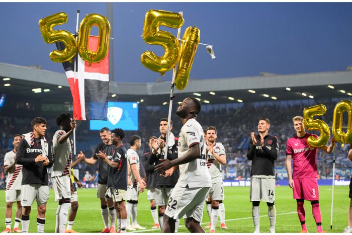 Victor Boniface with the half a century balloons celebrating Leverkusen's milestone.