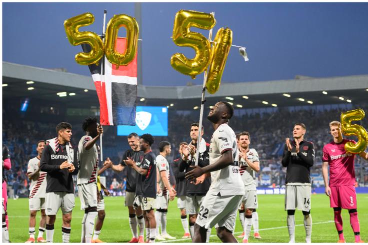 Victor Boniface with the half a century balloons celebrating Leverkusen's milestone.