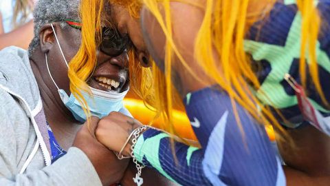 Sha'Carri Richardson celebrates winning the women's 100-meter final with grandmother Betty Harp on day 2 of the 2020 U.S. Olympic Track & Field Team Trials at Hayward Field on June 19, 2021 in Eugene, Oregon.© Courtesy