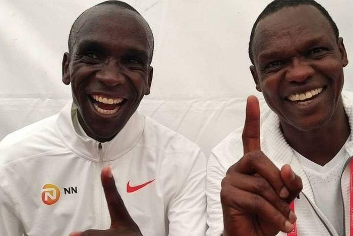 Eliud Kipchoge (L) and Coach Patrick Sang (R)