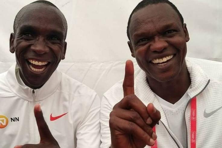 Eliud Kipchoge (L) and Coach Patrick Sang (R)
