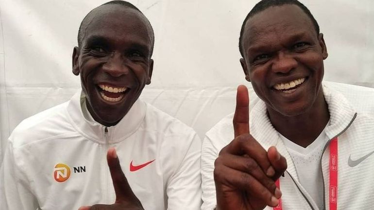Eliud Kipchoge (L) and Coach Patrick Sang (R)