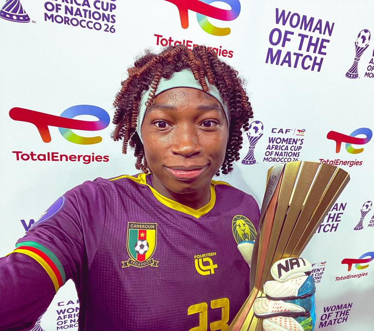 Michaely Bihina with another woman of the match award.