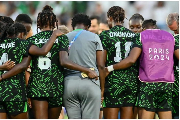 Super Falcons players in a huddle at the Olympic Games in Paris | X