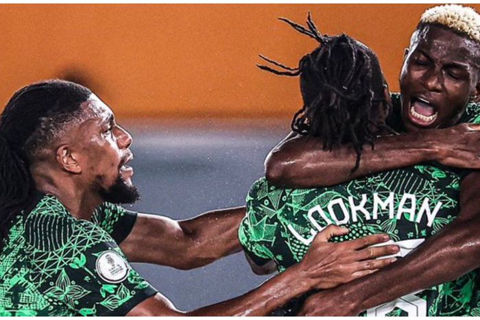 Alex Iwobi and Victor Osimhen celebrate a goal with Ademola Lookman at the AFCON 2023.