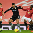 Manchester United players tackling Aston Villa's Anwar El Ghazi