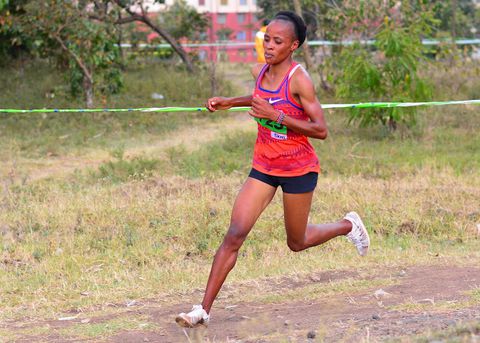 Homegirl Kwamboka shows SandraFelis and Miriam who is boss at Kisii Athletics Kenya Meet