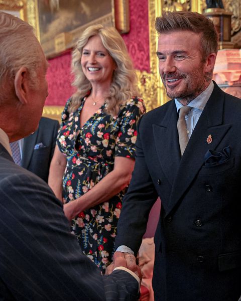 Former England midfielder David Beckham knighted by King Charles III for role in British sports.