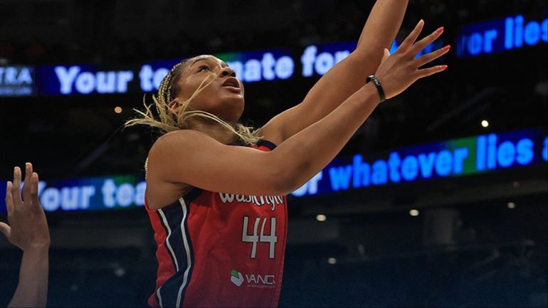 Nigerian-born Kiki Iriafen makes WNBA history with a double-double as Mystics defeat Storm.