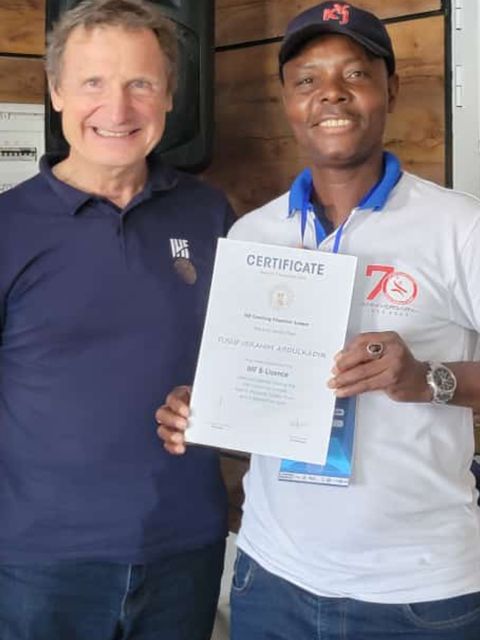 Yusuf Abdulkadir displays his certificate.